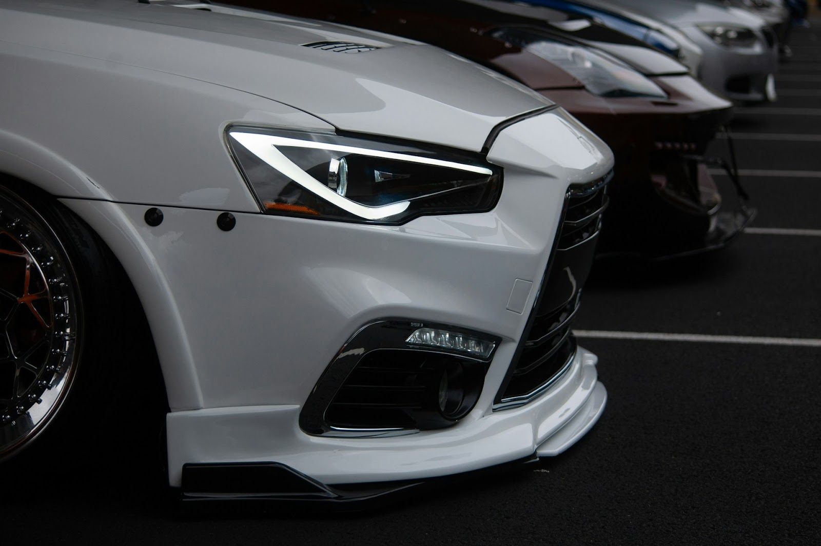cars at a Brisbane Mitsubishi dealership lot